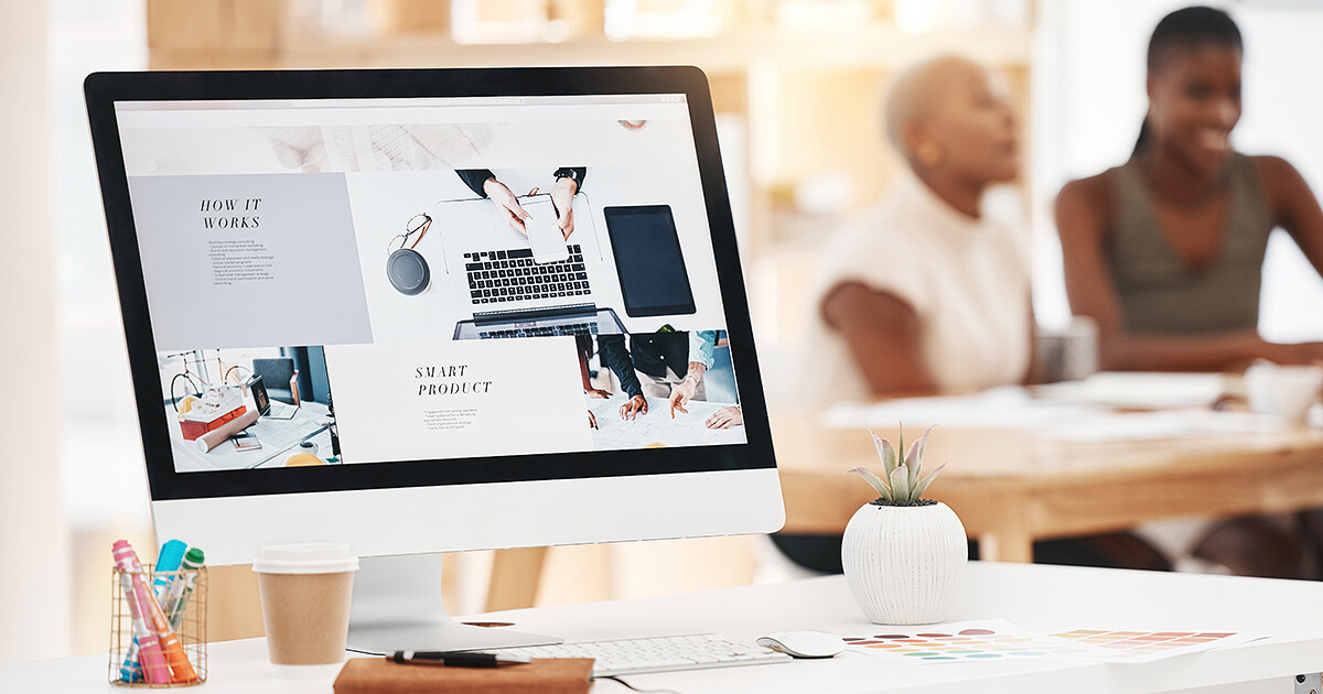 Looking at website with people in the background