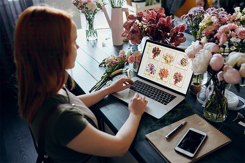 Flower shop owner updating her website