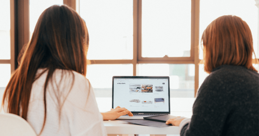women looking at laptop