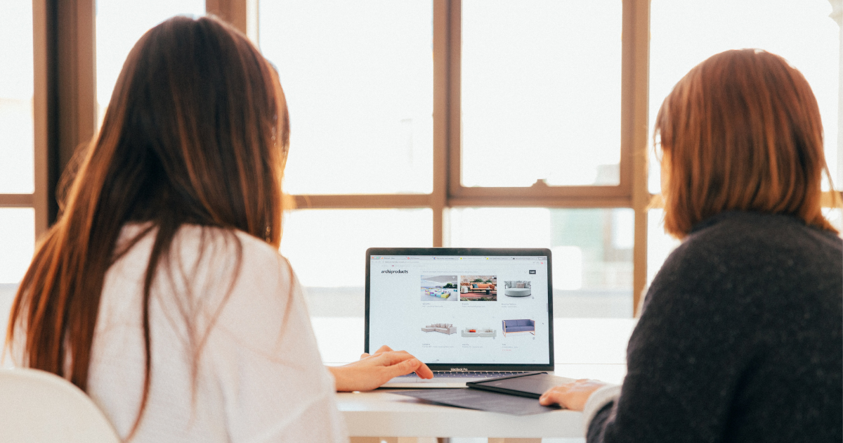 women looking at laptop