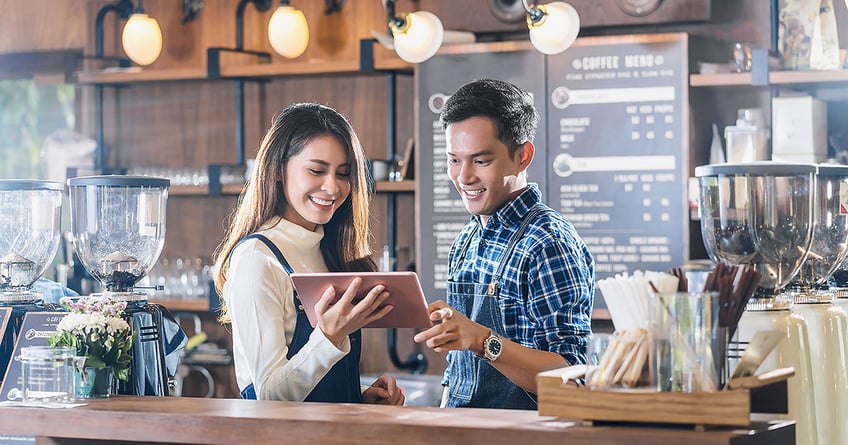 Young Business owner Discussing the Queensland Government Business Boost Grants Program