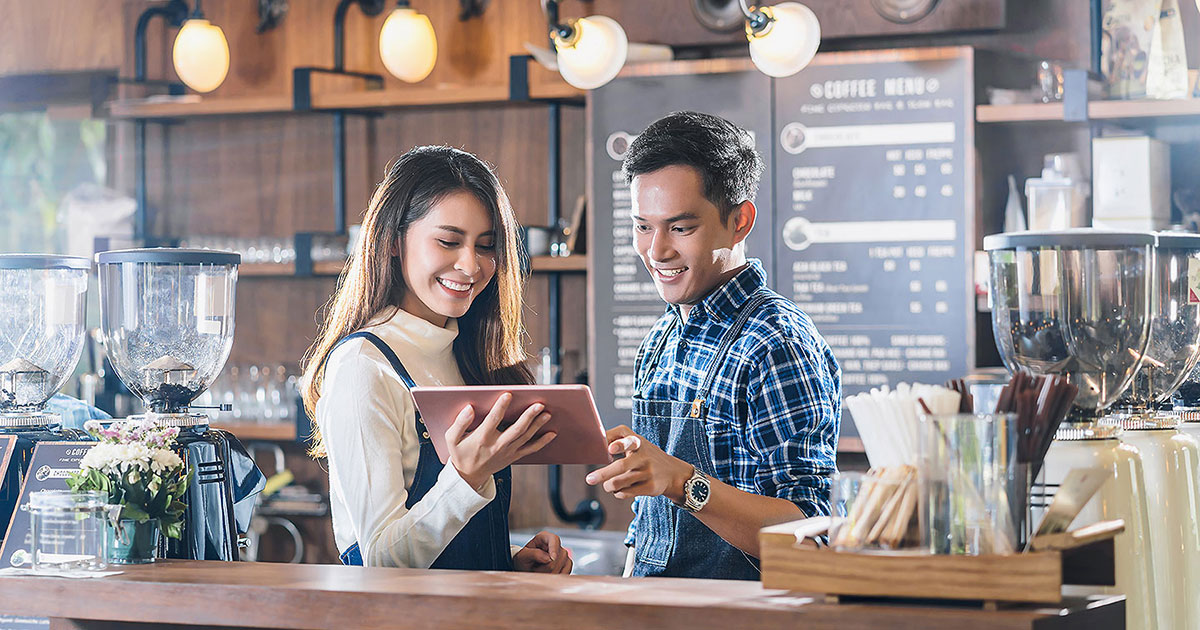 Young Business owner Discussing the Queensland Government Business Boost Grants Program