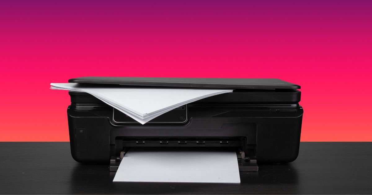 printer with pink background and water